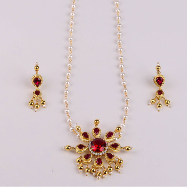 Angled view of Silver Tanmani Pink Flower Pendant Set gold plated