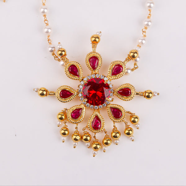 Angled view of Silver Tanmani Pink Flower Pendant Set gold plated