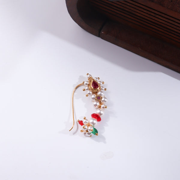 Wooden jewelry box with pearl and ruby nose ring