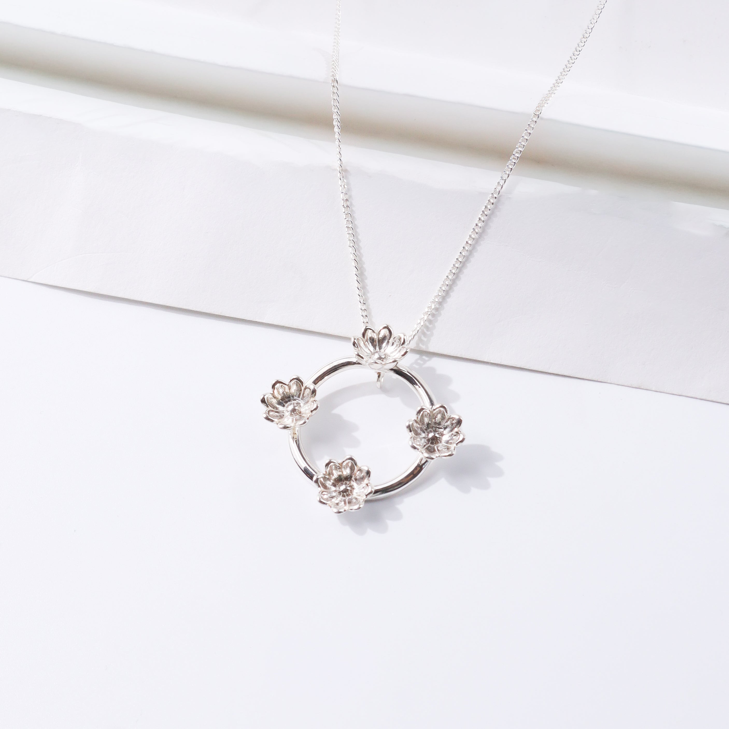 Four Flower Pendant Necklace
