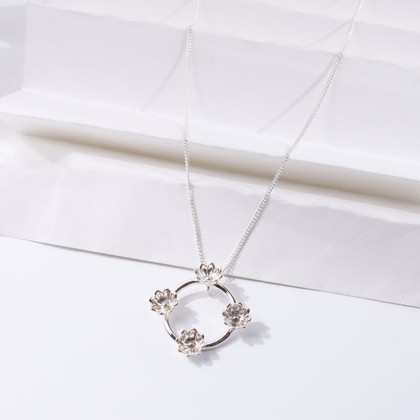Four Flower Pendant Necklace