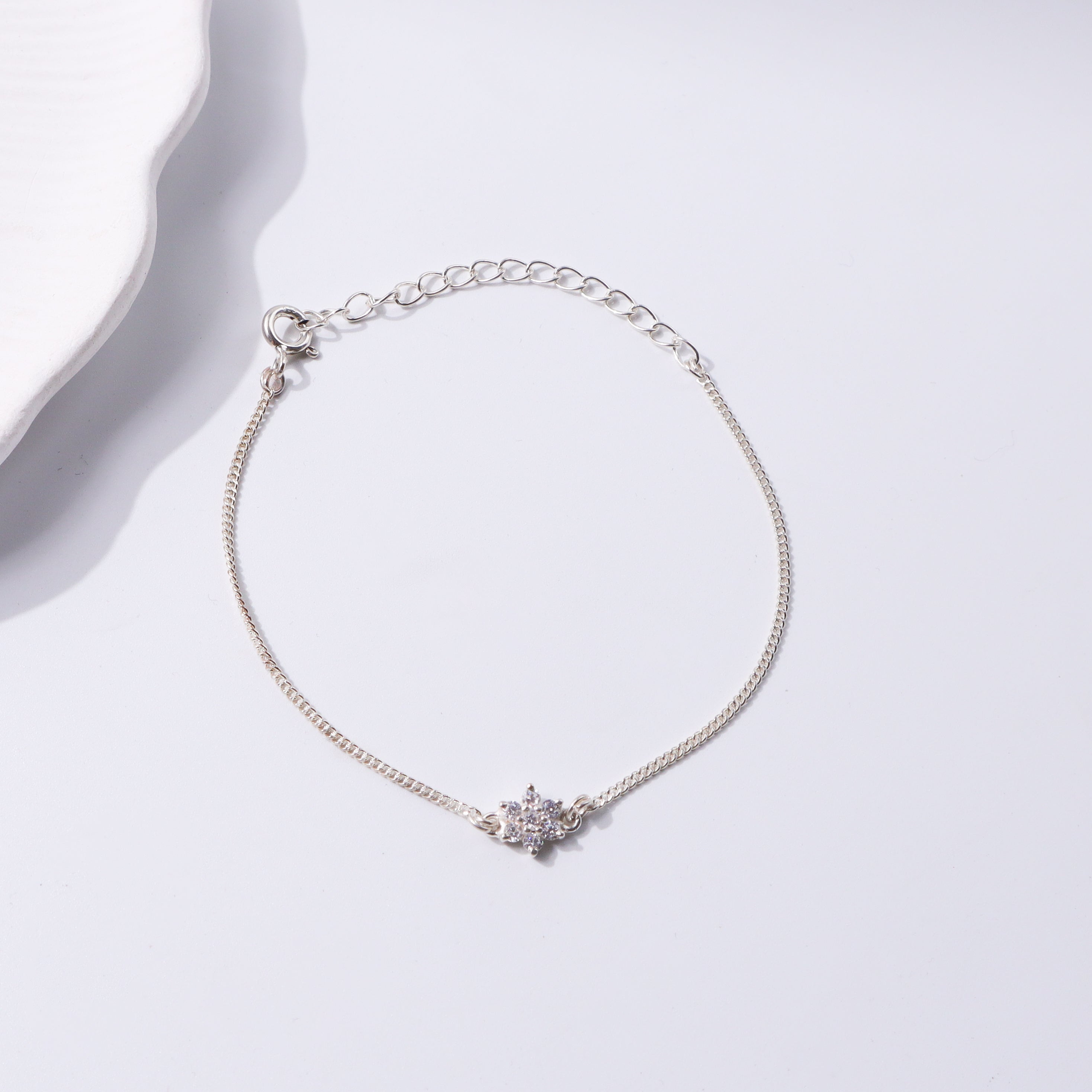 Silver floral necklace with sparkling stones