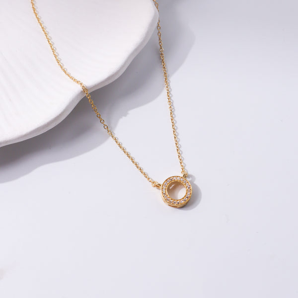 Gold circle CZ pendant necklace with silver chain