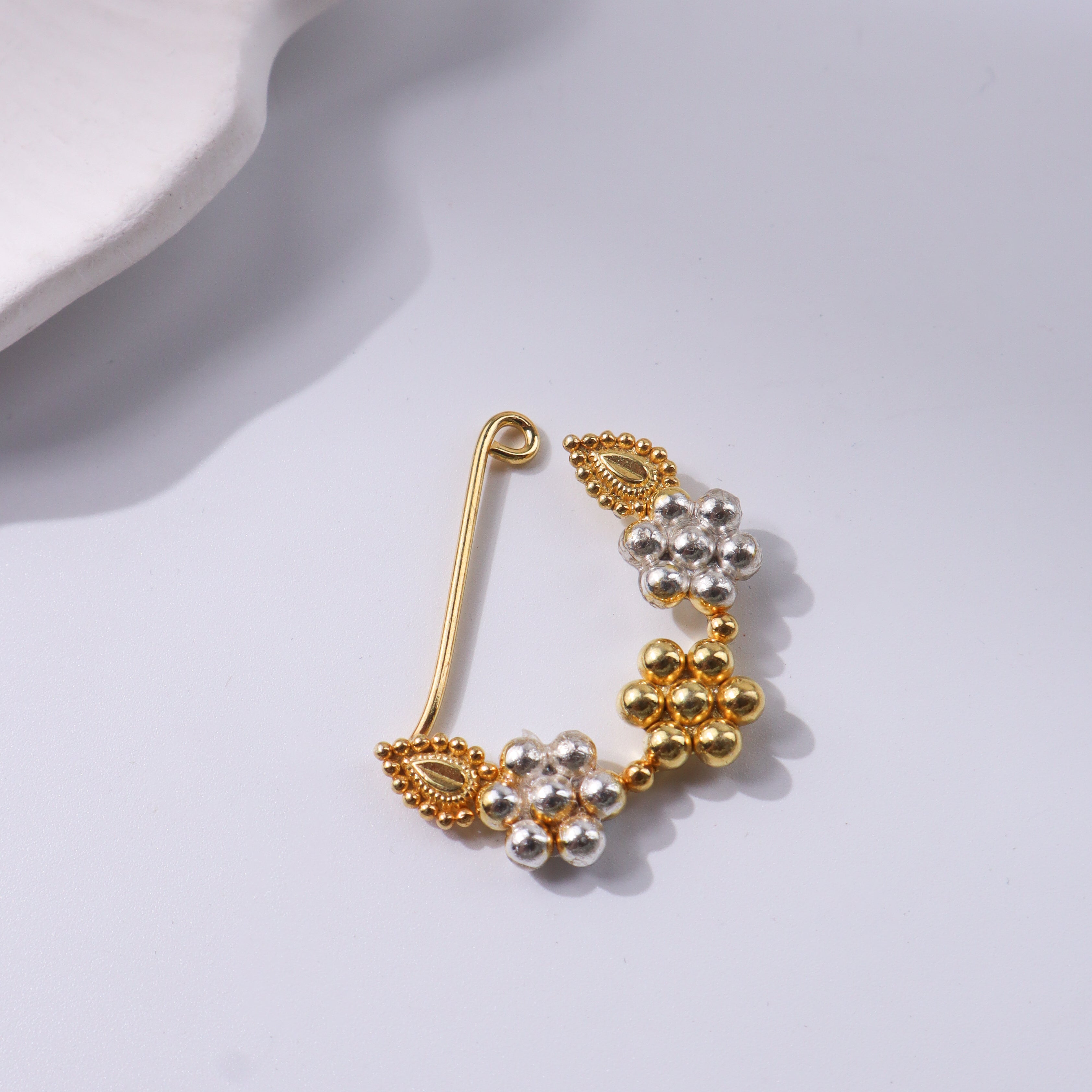 Gold and silver floral Nath with pearl accents