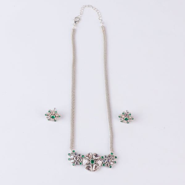 Silver chain necklace with green and clear stones