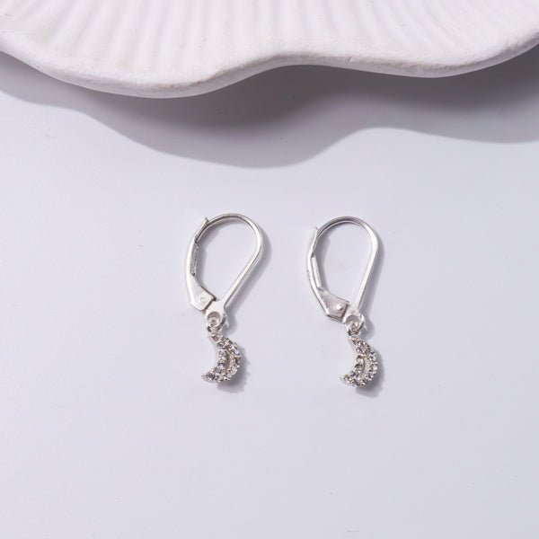 Silver crescent moon earrings with rhinestones