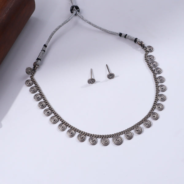 Silver spiral jewelry set with matching earrings
