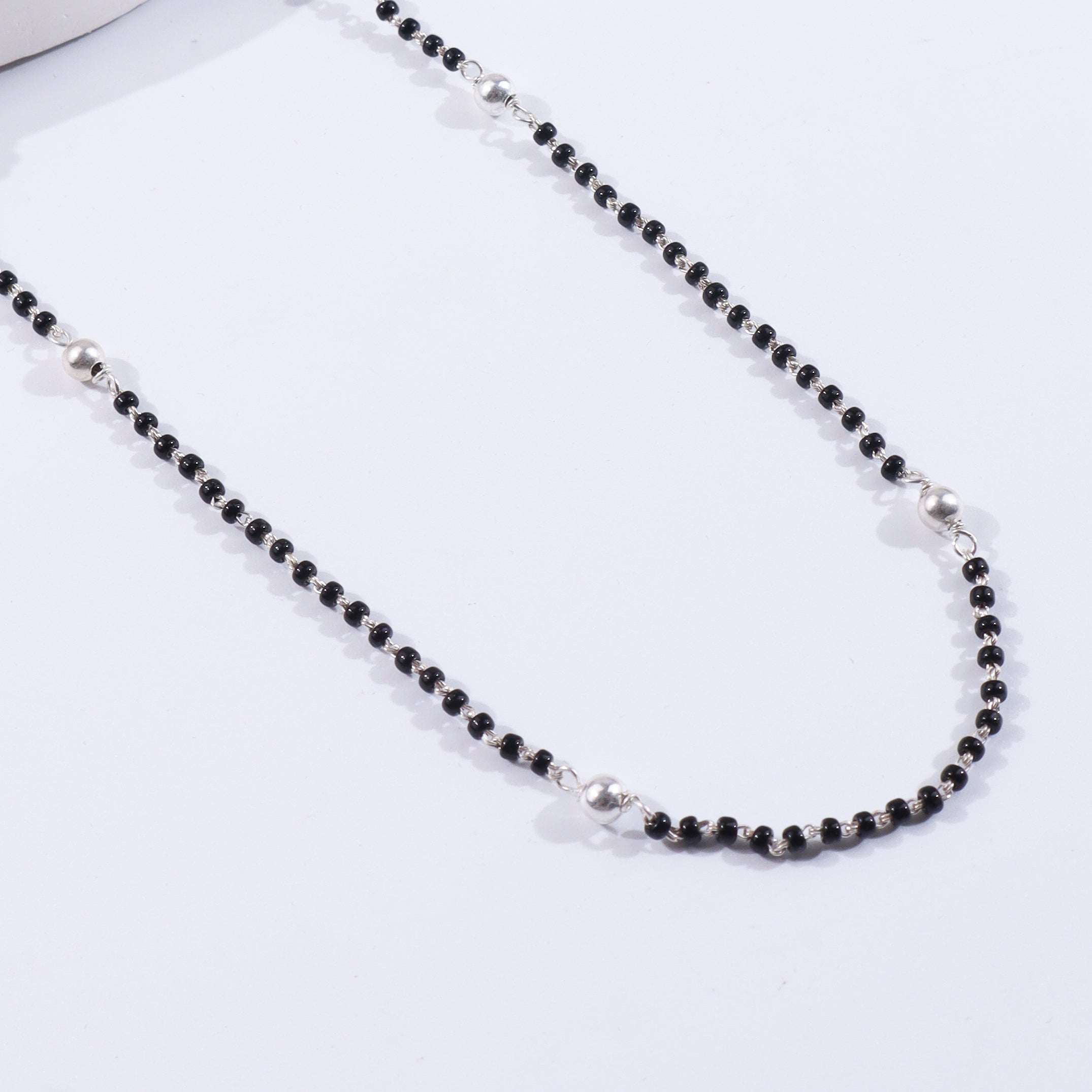 Sterling silver beaded necklace with black and silver beads