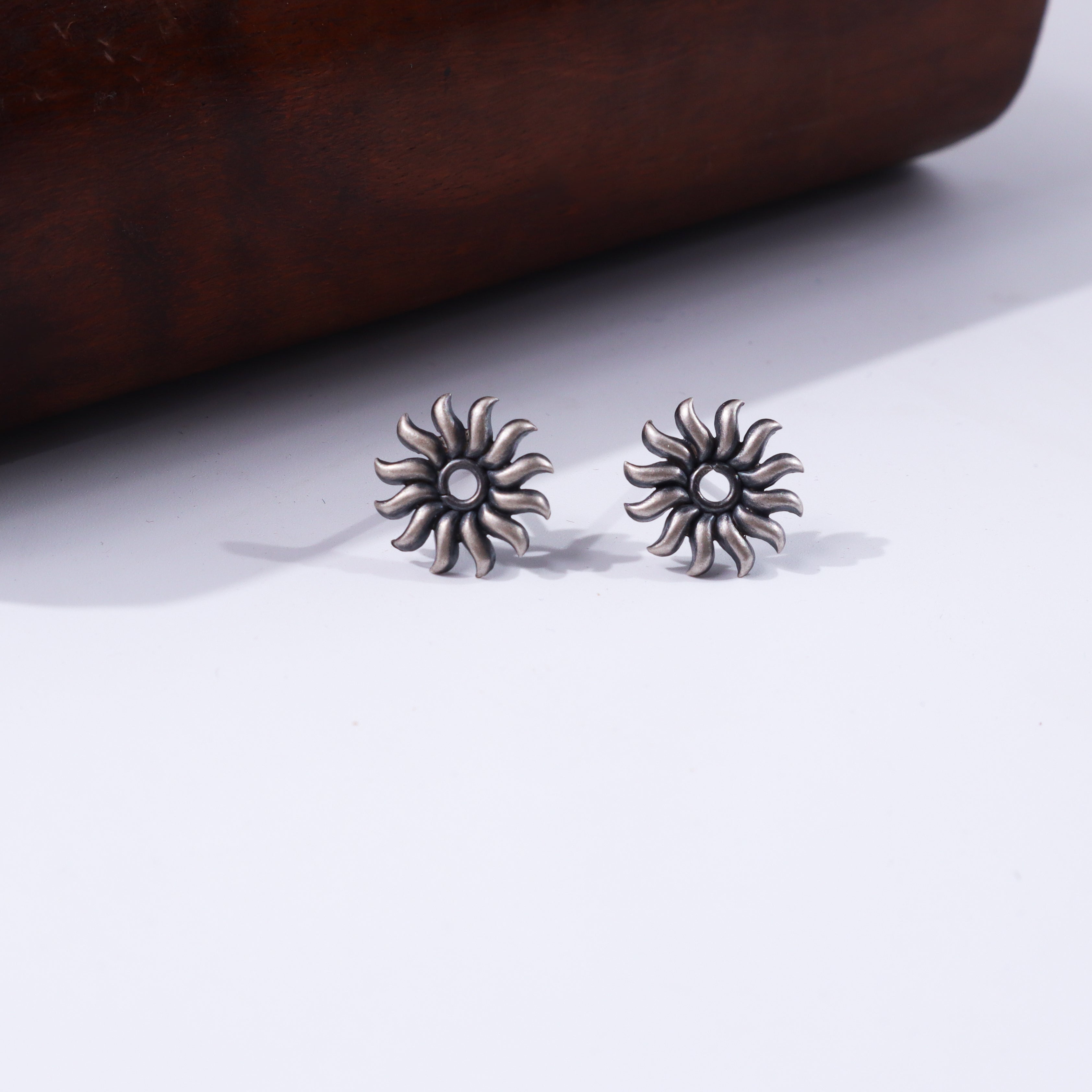 Silver Sun Motif Studs earrings with sunburst design