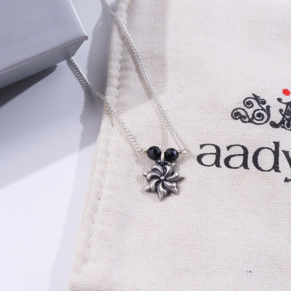 Silver chain with black beads