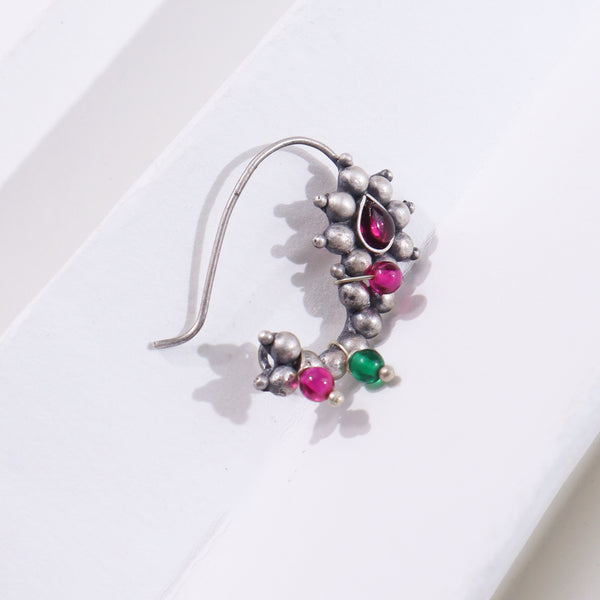 Silver jewelry with pink and green beads