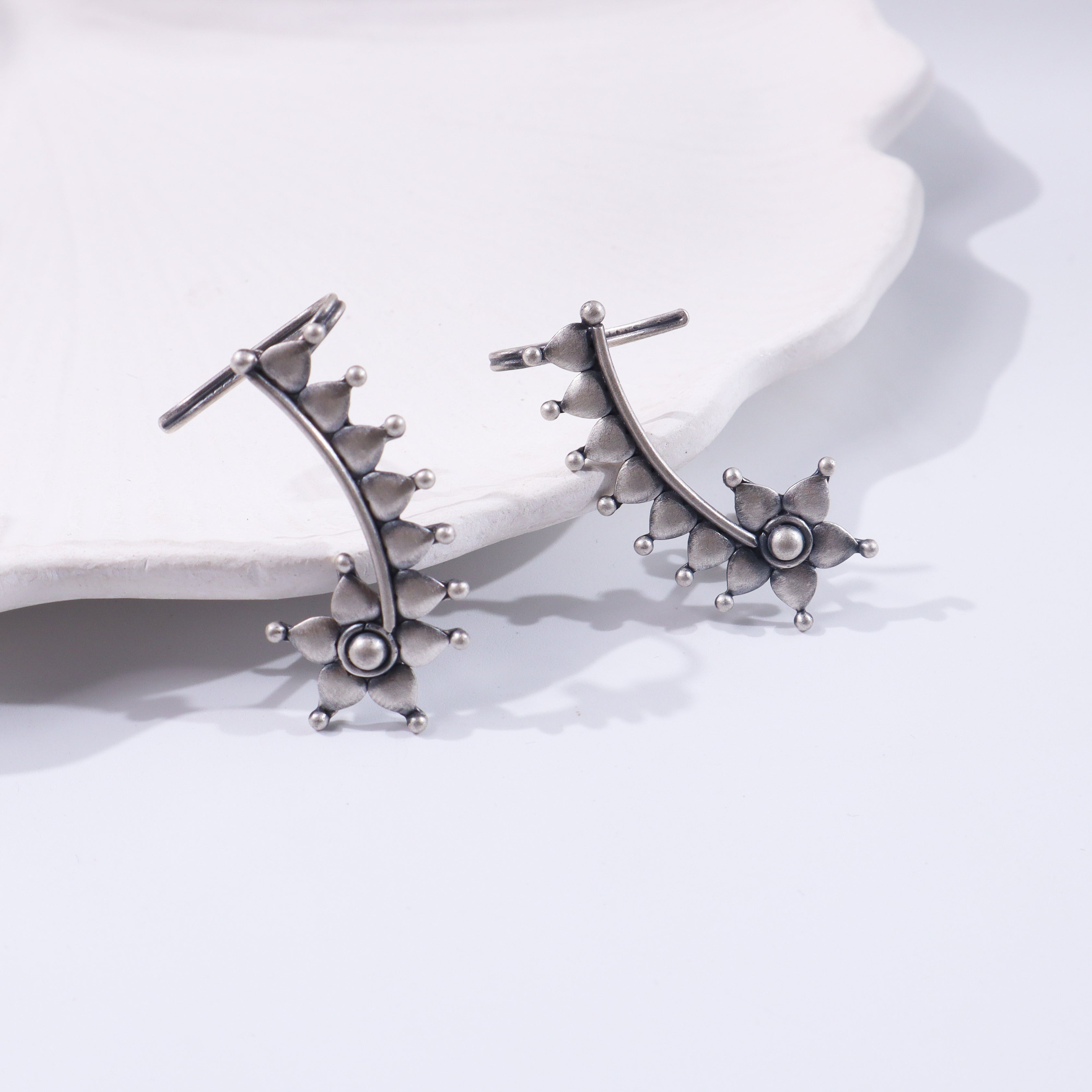 Sterling silver earrings with floral design