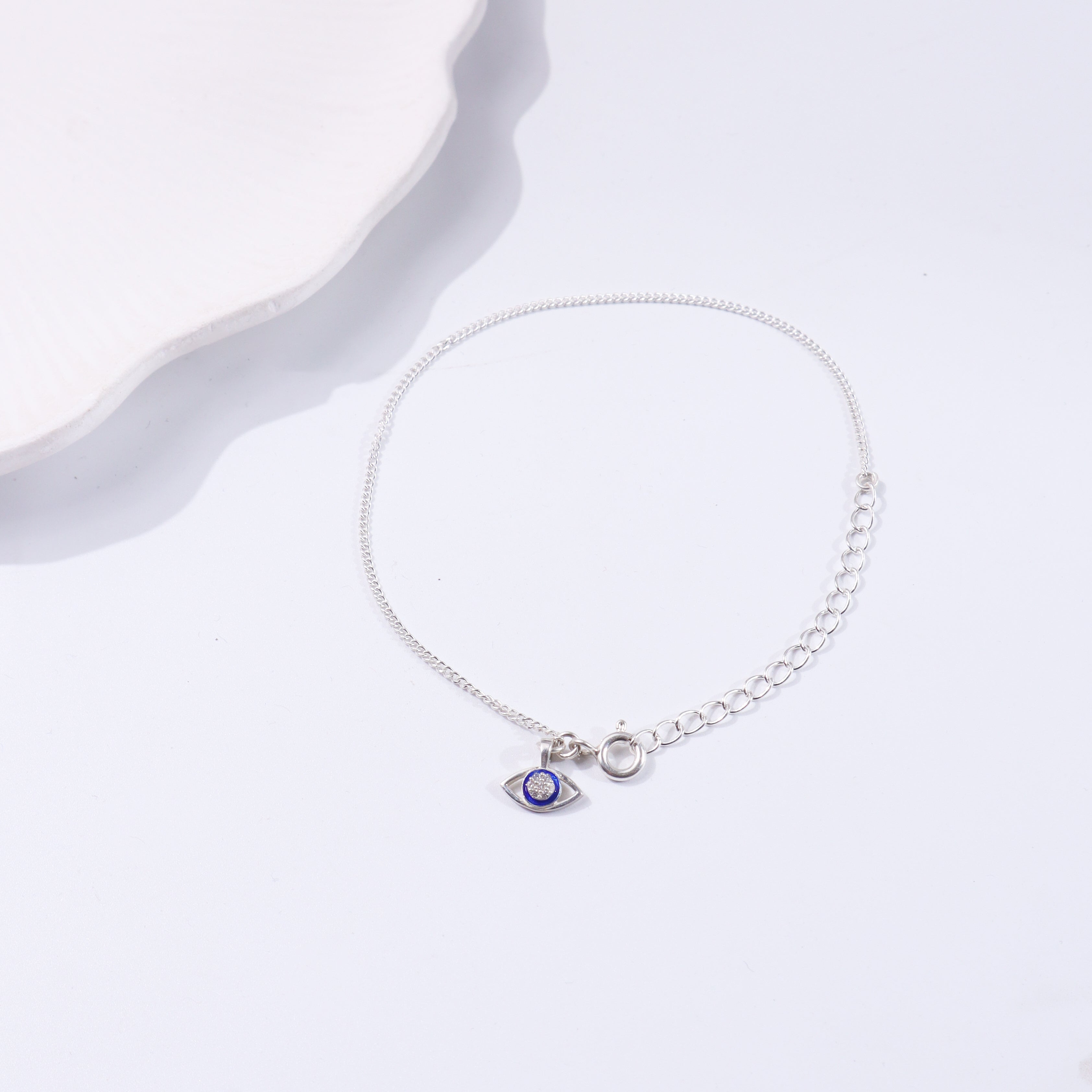 Silver chain necklace with evil eye pendant