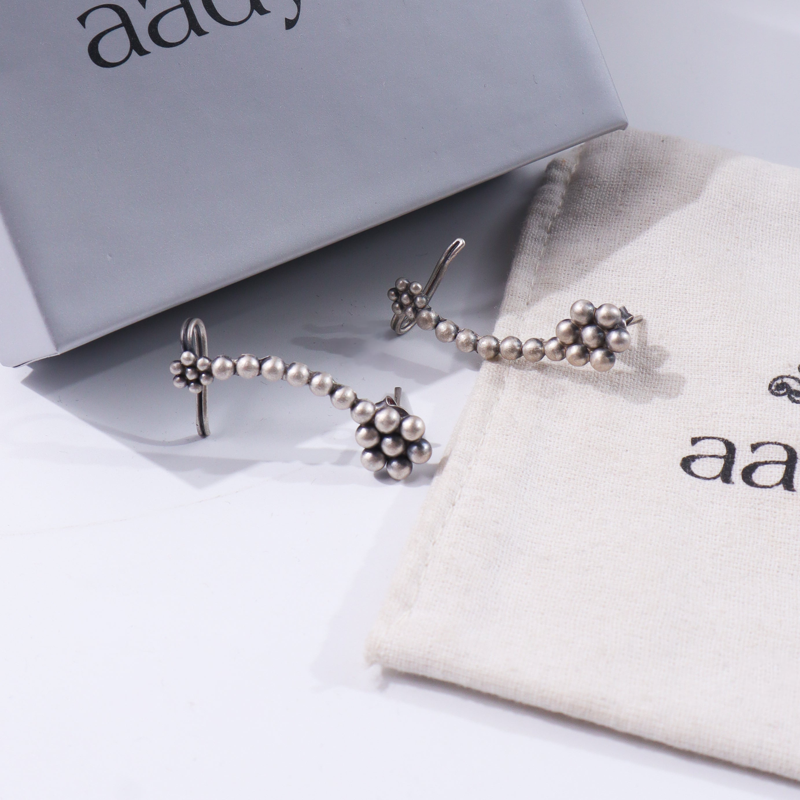 Sterling silver earrings with traditional bead design
