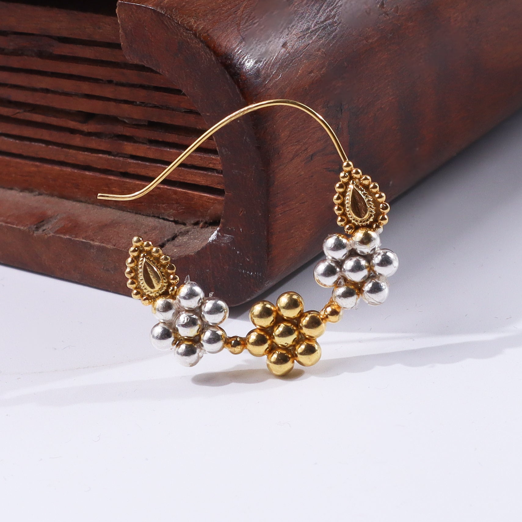Gold and silver beaded traditional earring with teardrop design