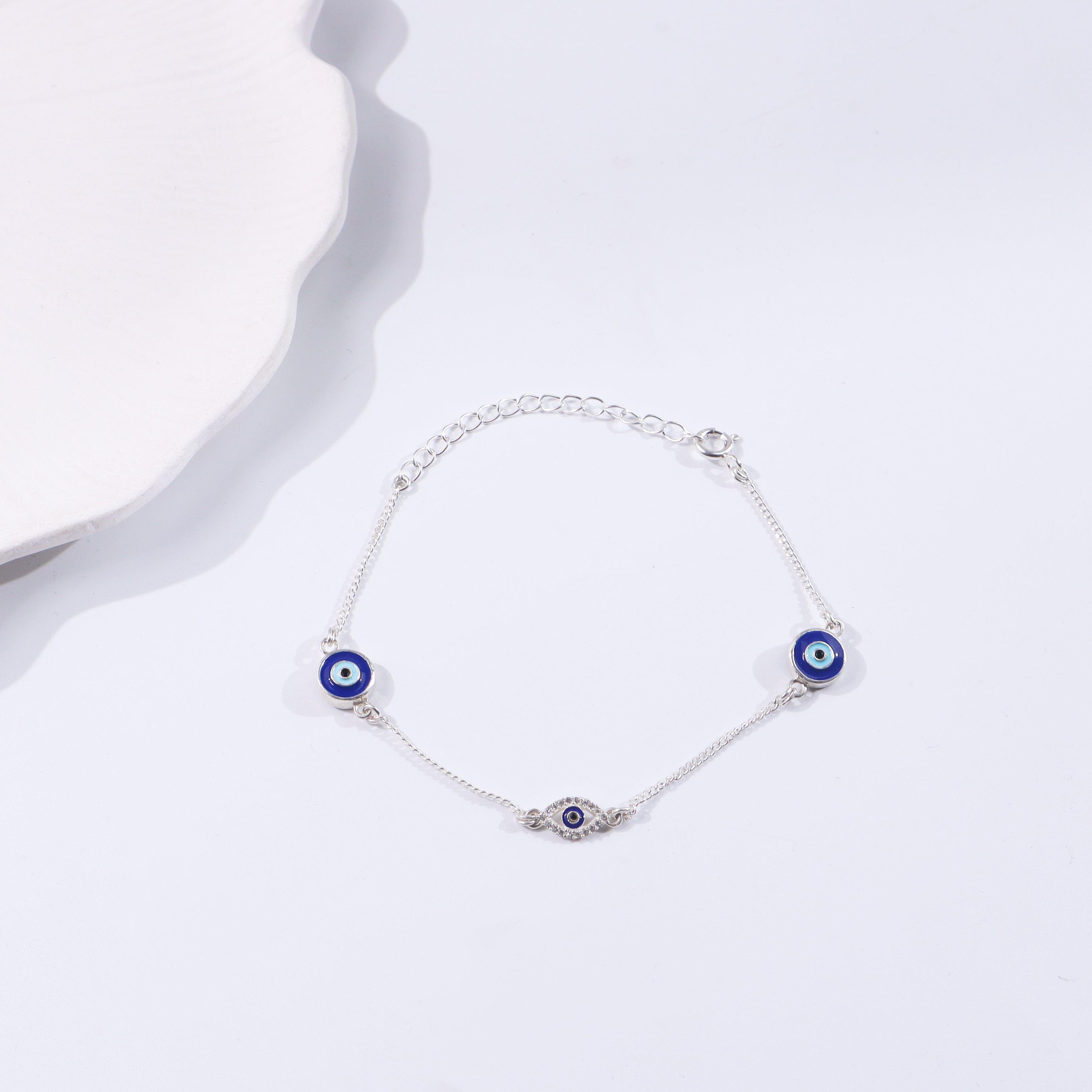 Silver Evil Eye bracelet with blue eye charms on chain