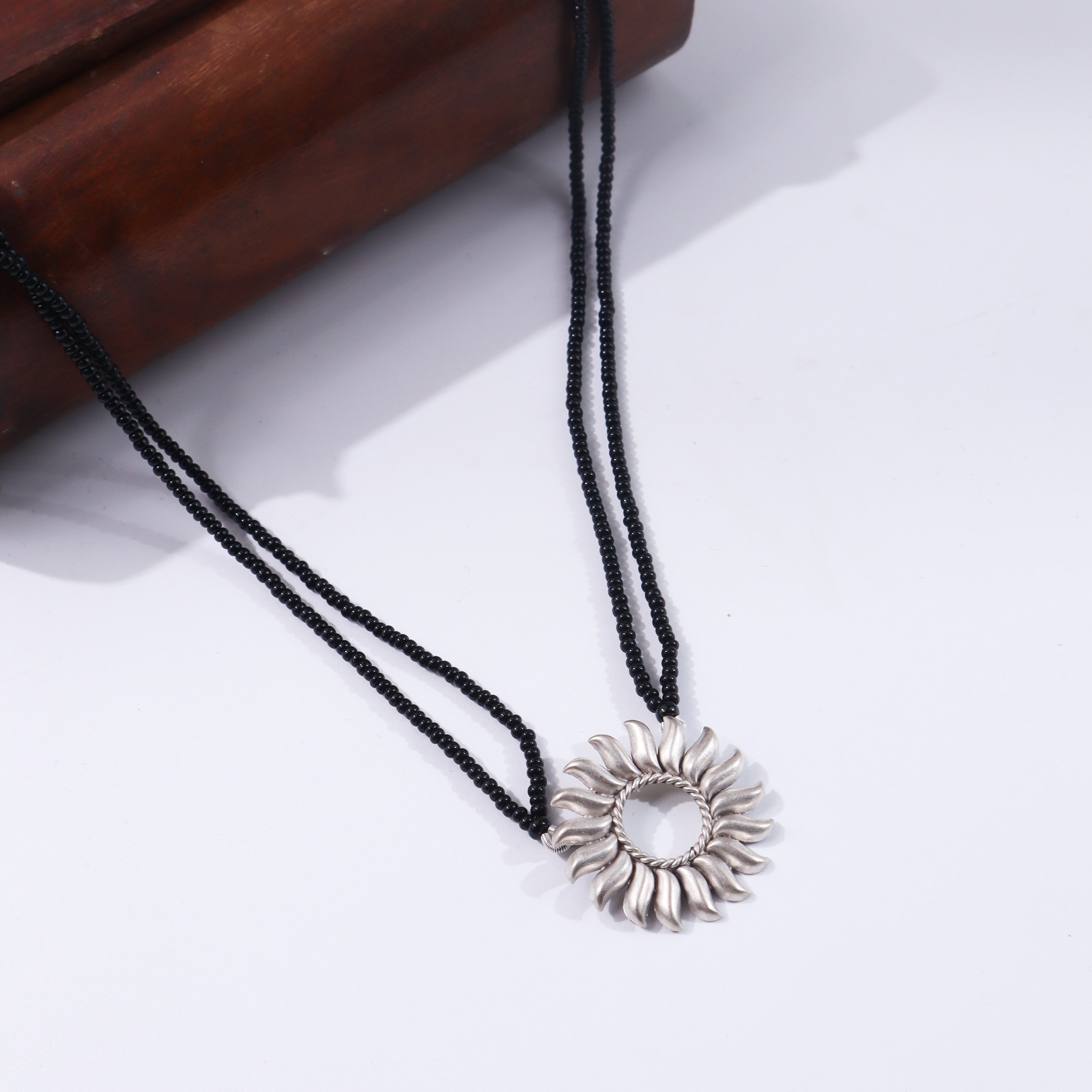 Black beaded Surya Mangalsutra with silver pendant