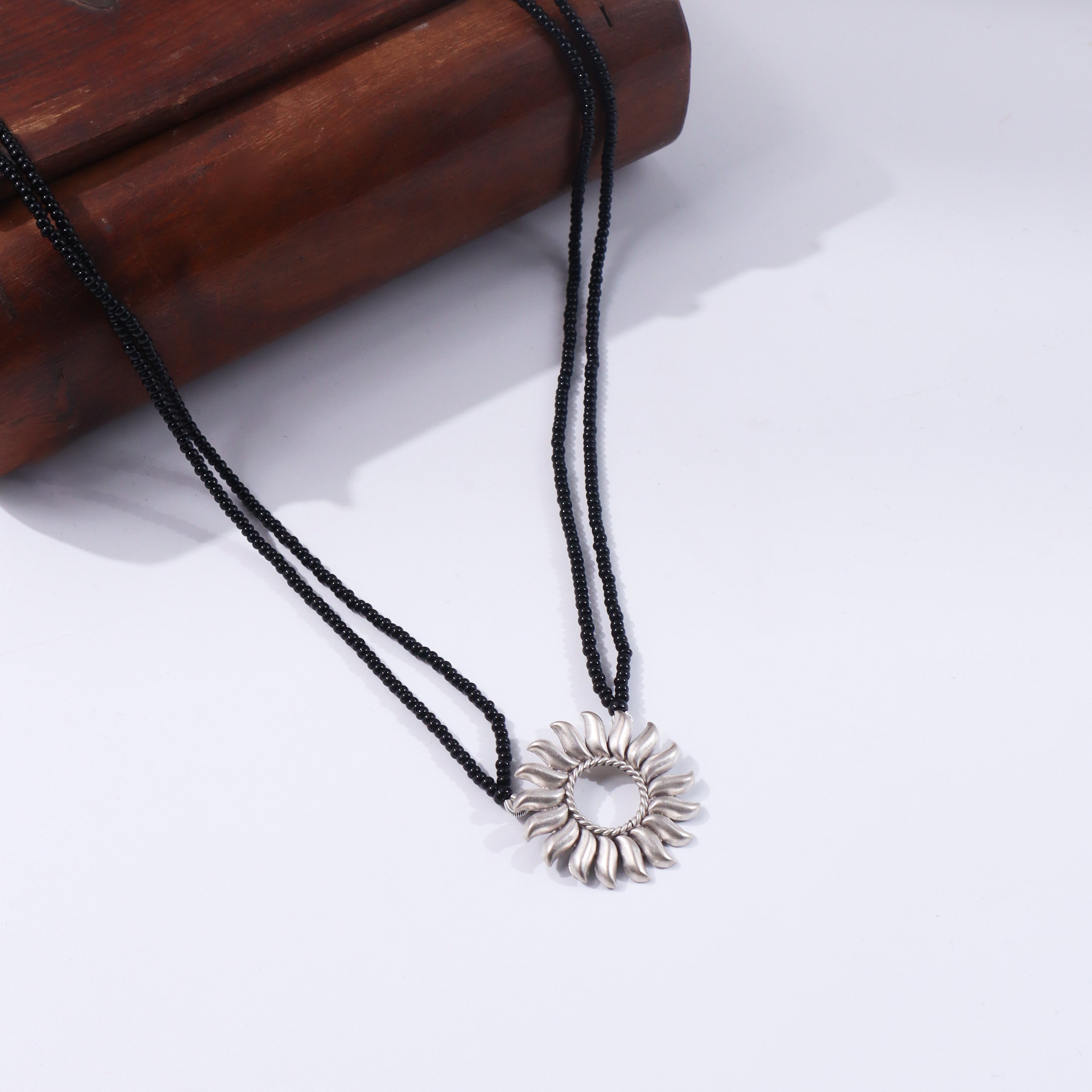 Black beaded Surya Mangalsutra with silver pendant