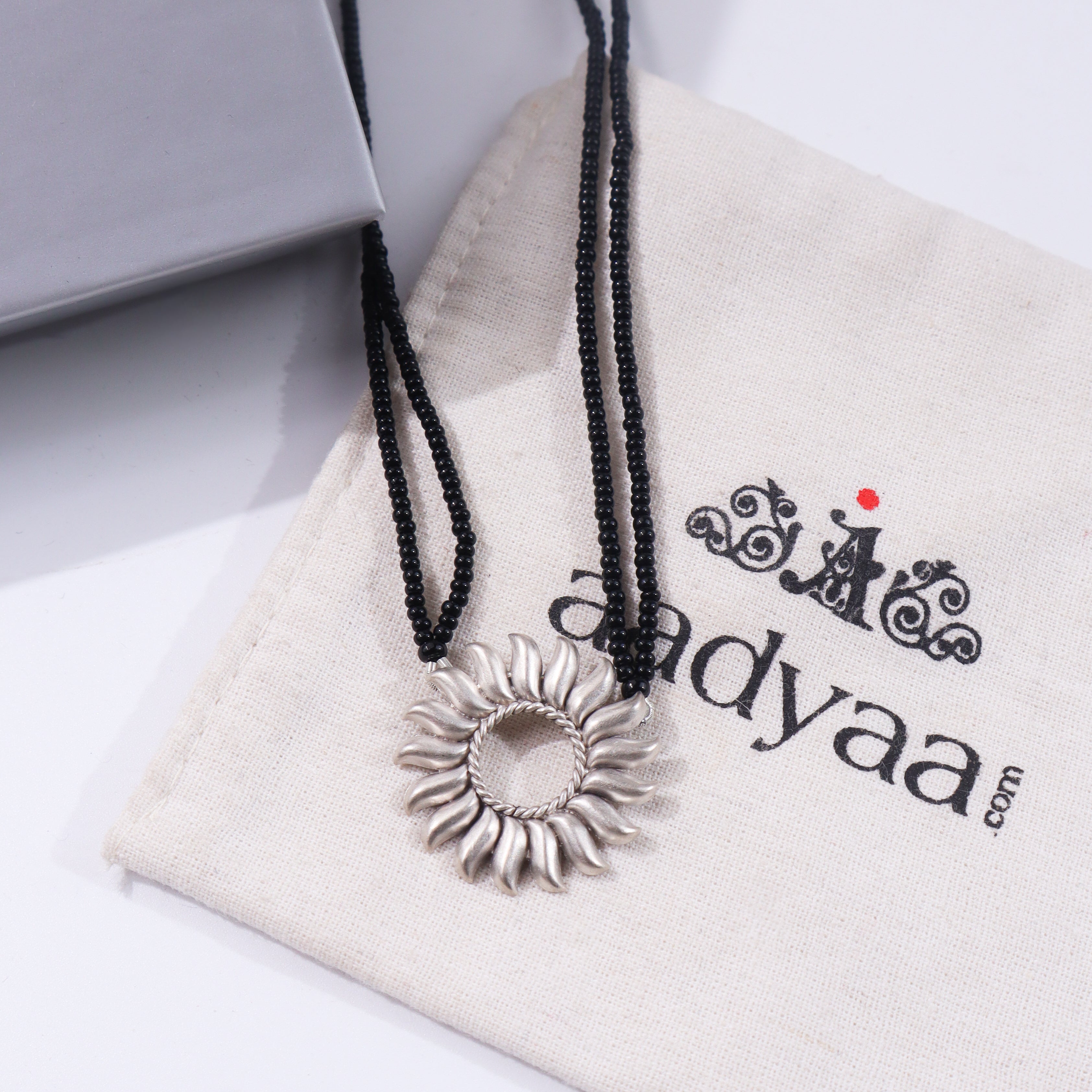 Black beaded Surya Mangalsutra with silver pendant