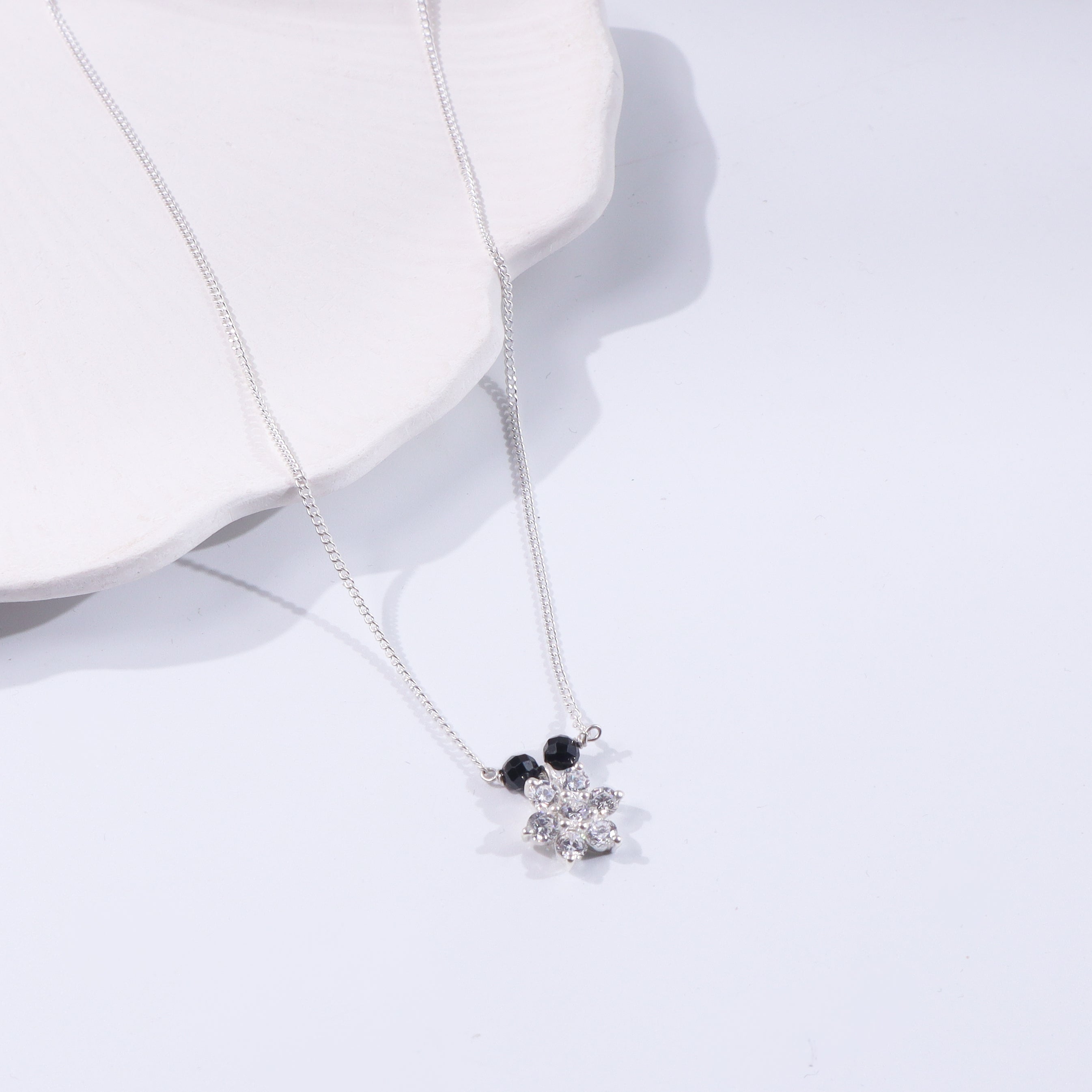 Silver necklace with black and clear stones, elegant jewelry for women