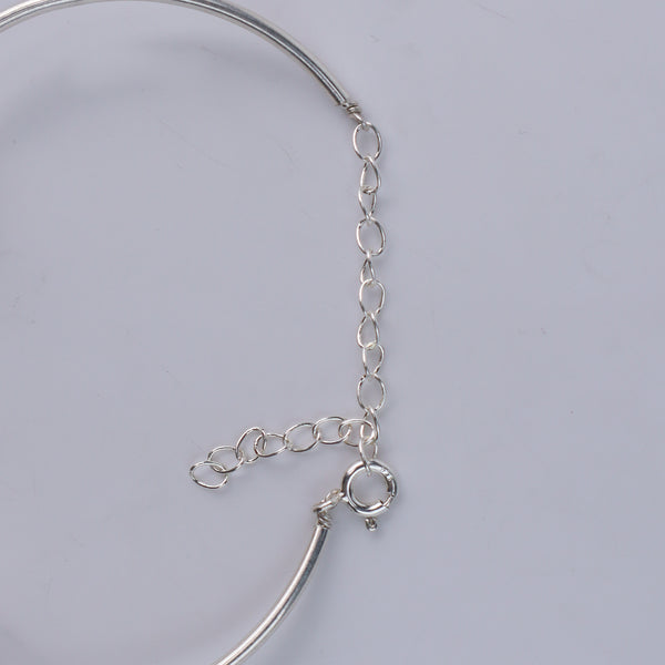 Back view of silver pearl bracelet with adjustable chain