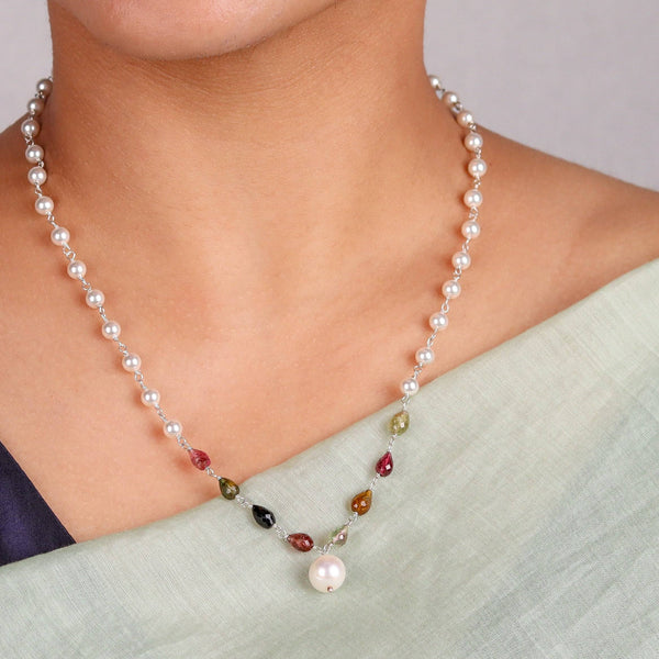 Close-up of pearl Ganthan necklace highlighting natural pearls and sparkling semiprecious stone detailing