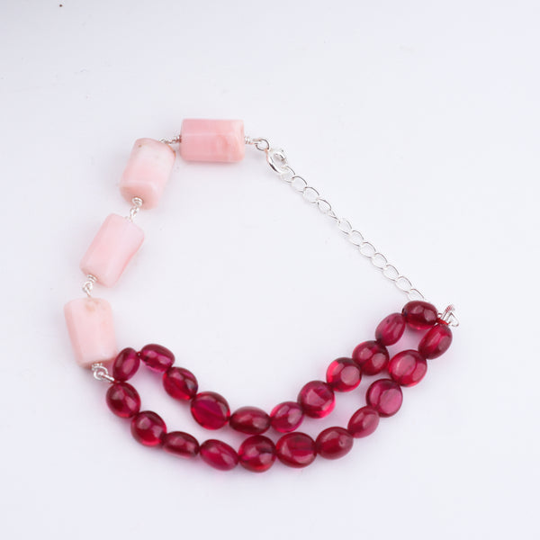 Angled view of Pink Opal & Ruby Stones Half & Half Silver Bracelet