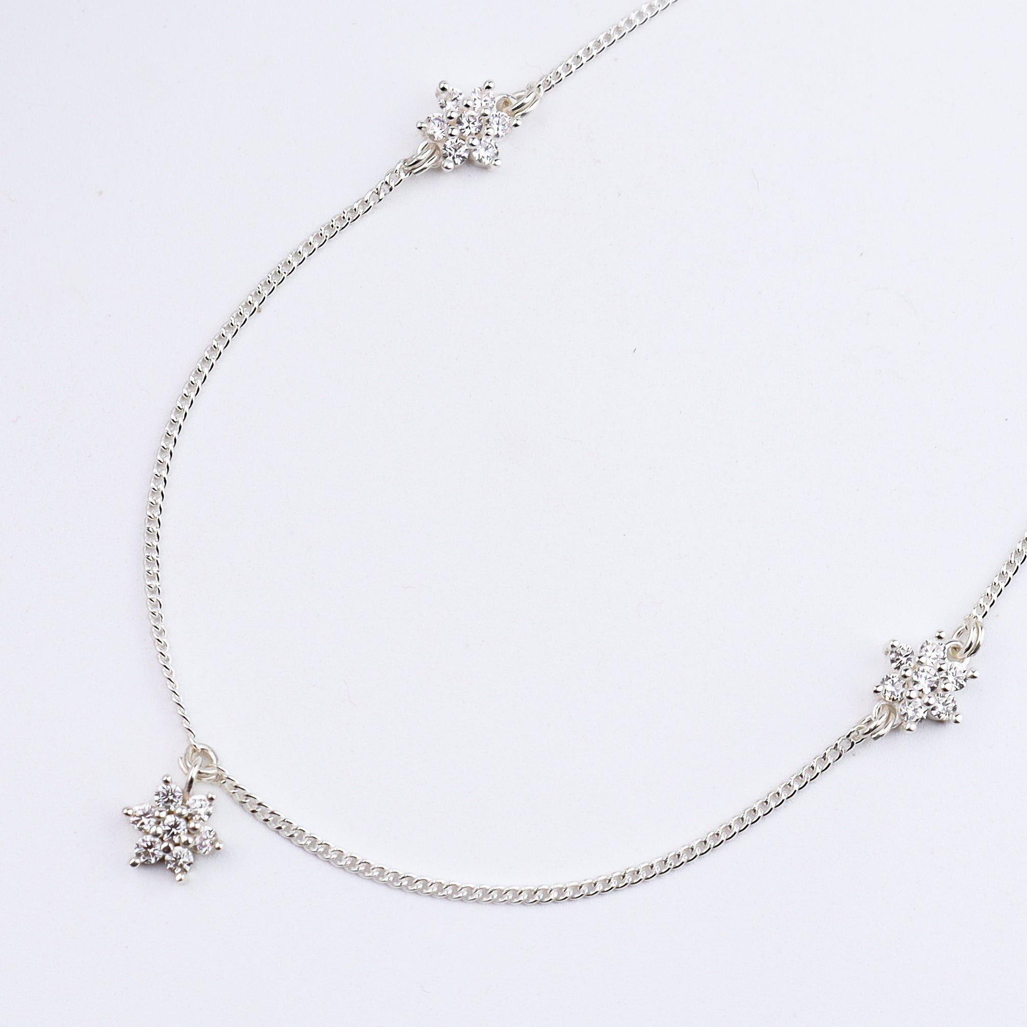 Silver CZ Flower Multi Motif Necklace – Small