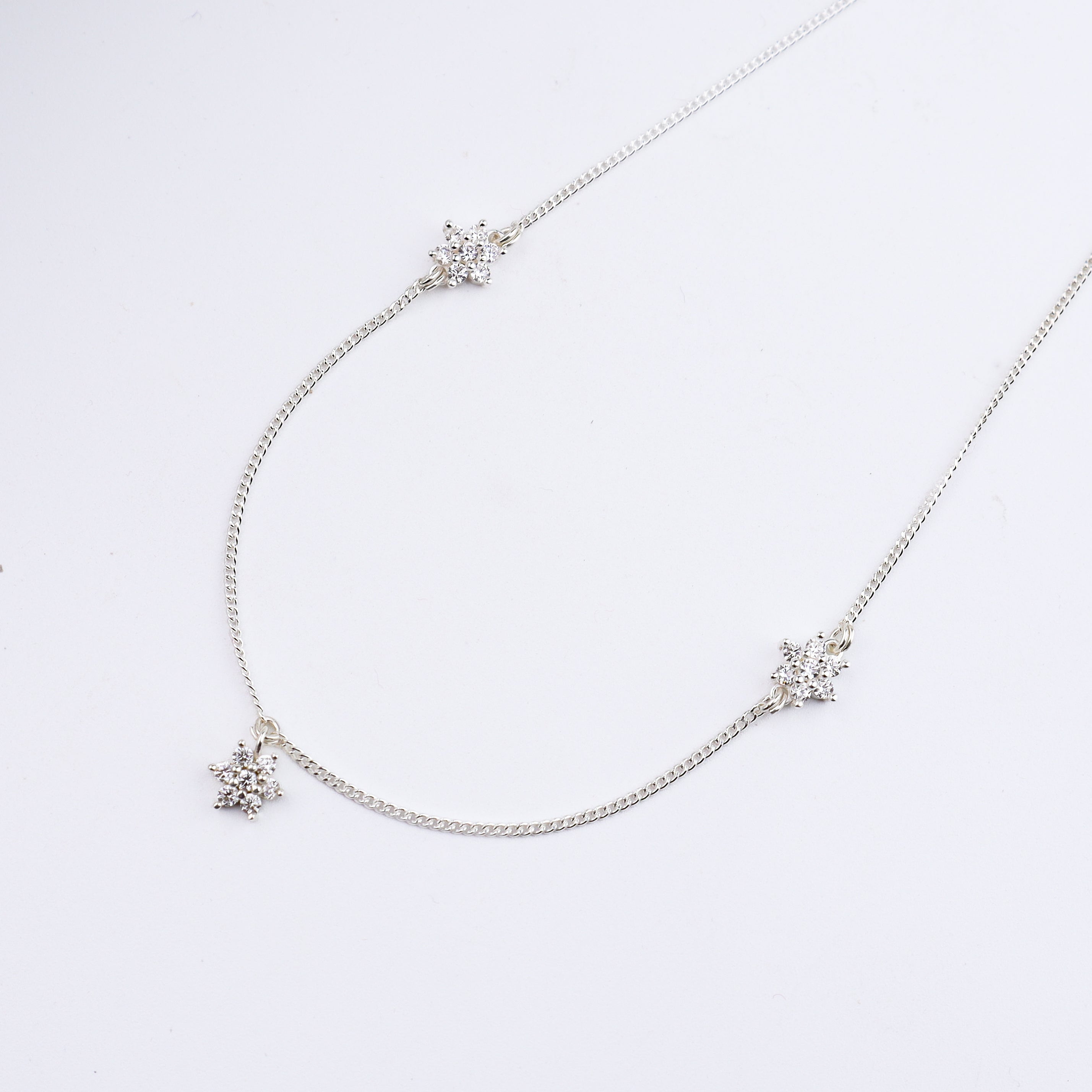 Silver CZ Flower Multi Motif Necklace – Small