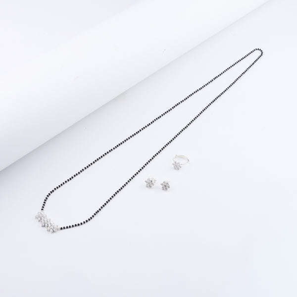 Detail shot of CZ flower motif and polished silver finish
