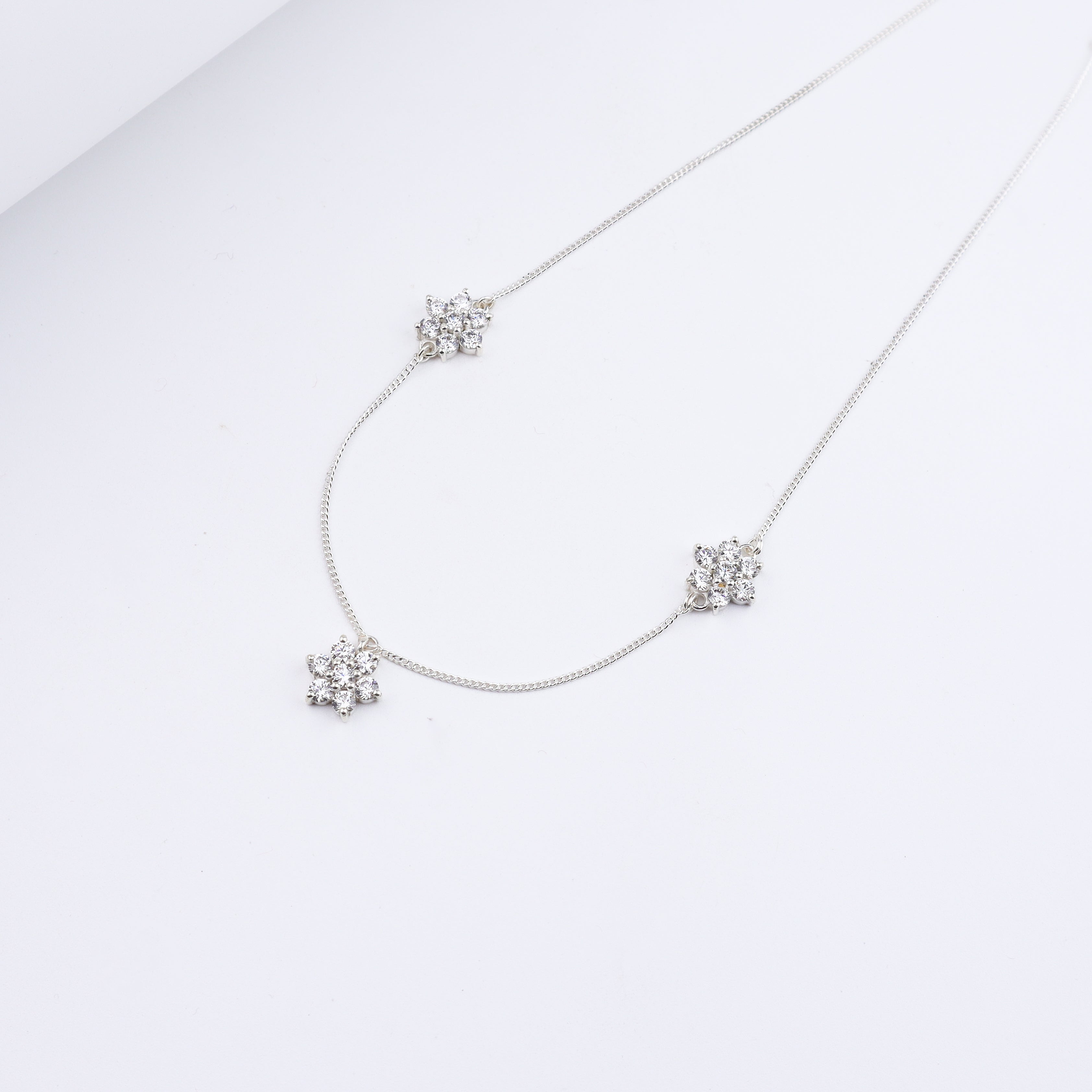 Silver CZ Flower Multi Motif Necklace – Big