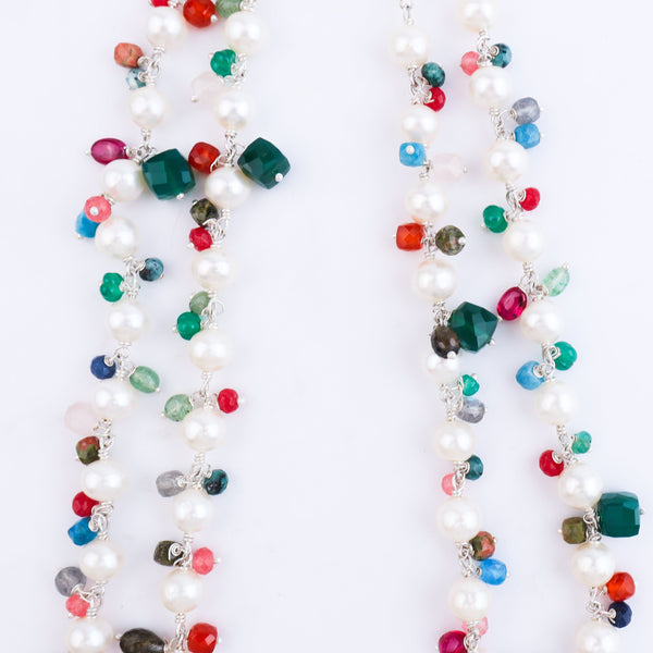 Close-up of multicolored pearl necklace with beads