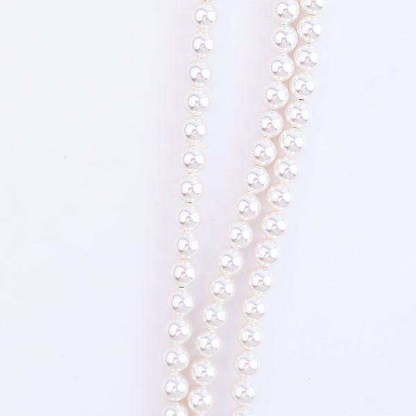Red faceted beads and white pearls on silver chain