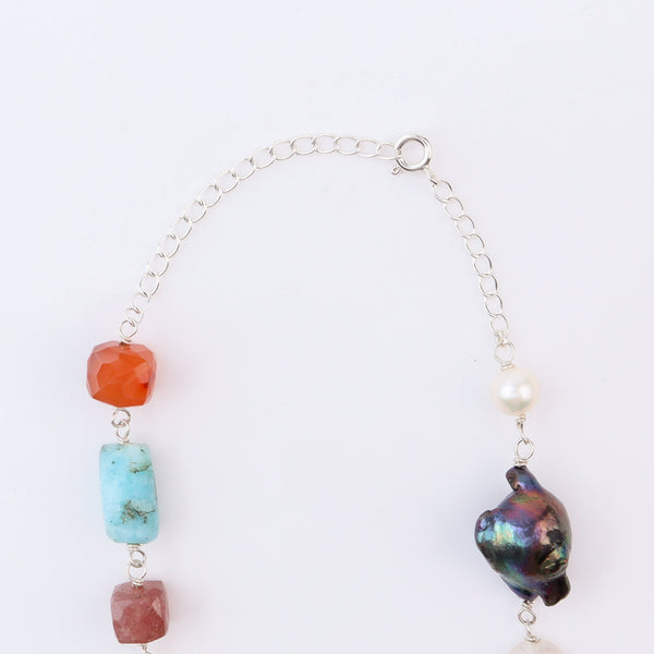 Close-up of necklace clasp with chain links
