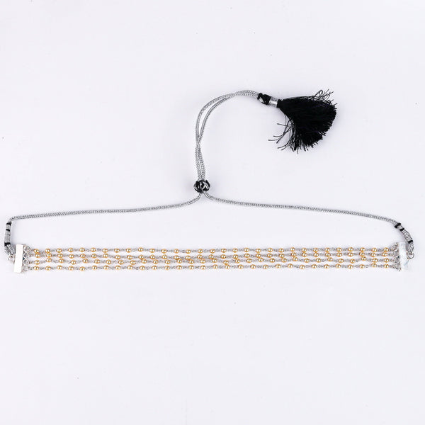 Angled side view of 92.5 silver golden pearl choker showing smooth pearl alignment and rich gold tone