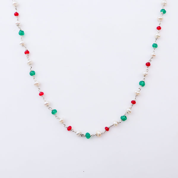 Colorful beaded necklace with pearls, red, green, and white beads