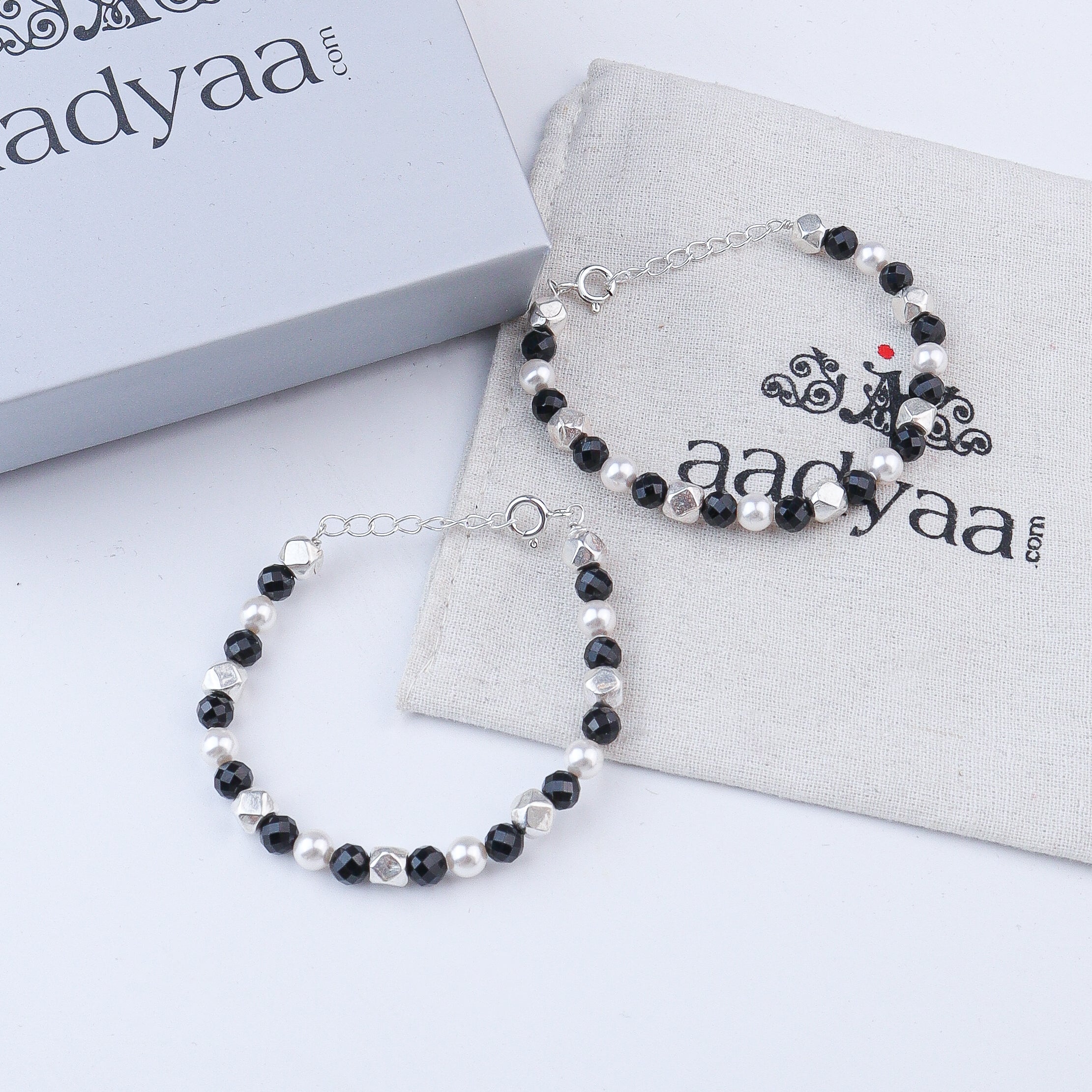 Ashtapailu Silver Baby Bracelet with Black Spinel & Pearls