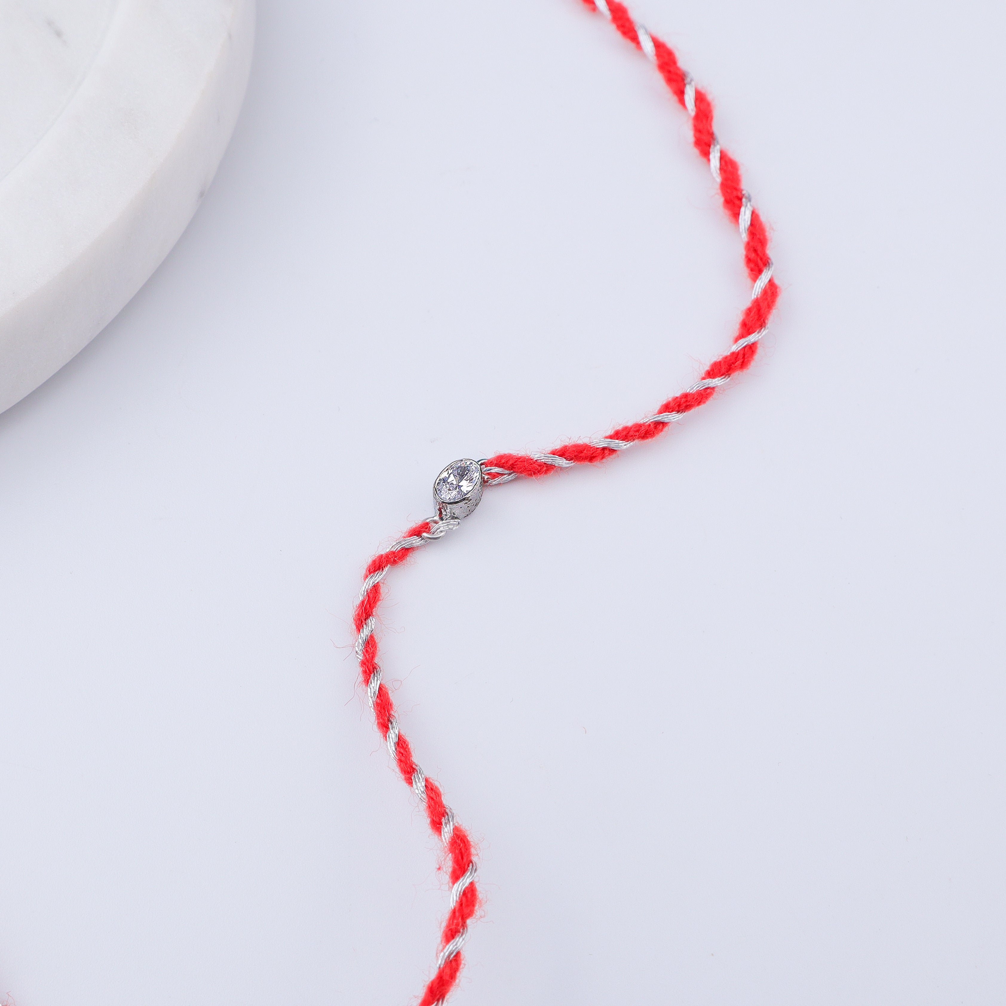 Oval Bezel Silver CZ Rakhi