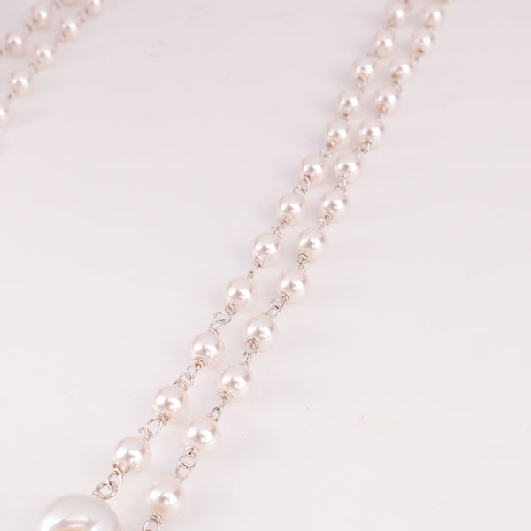 Model wearing 2 layer fresh water pearl necklace for elegant evening styling