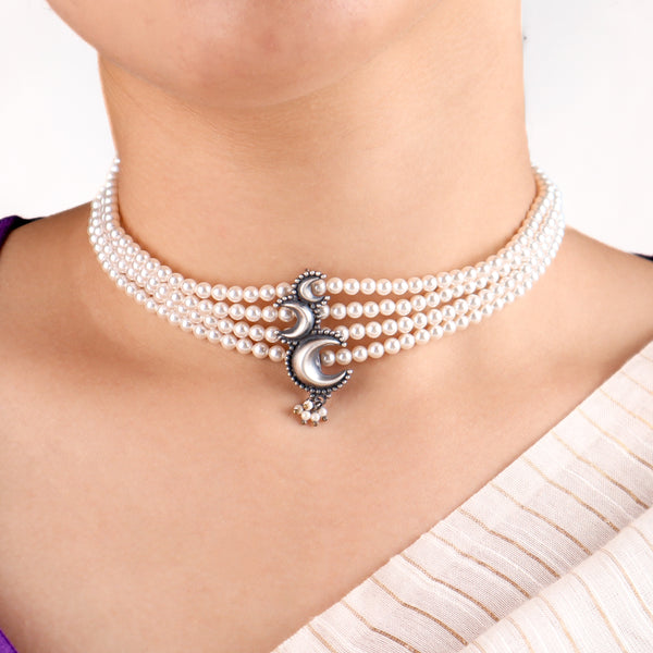 Close-up of Chandrakor pearl choker highlighting handcrafted crescent design and natural pearl detailing