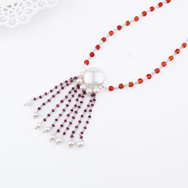 Angled view of Luxe Necklace Carnelian Rhodonite Pearls