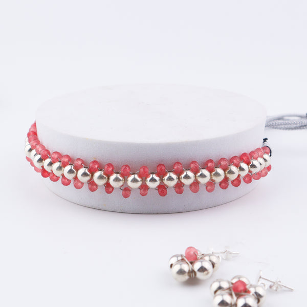 Detail shot of silver bead thushi pattern and quartz accents