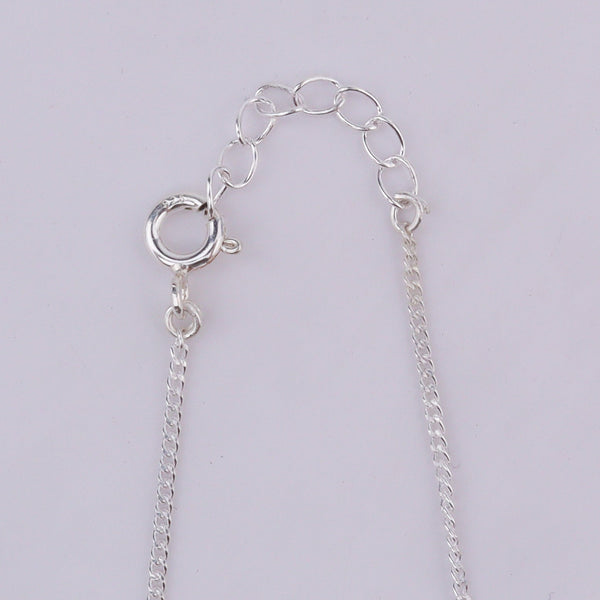 Silver chain with adjustable clasp and donut pendant