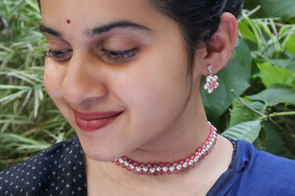 Model wearing Silver Bead Thushi Set with Cherry Quartz
