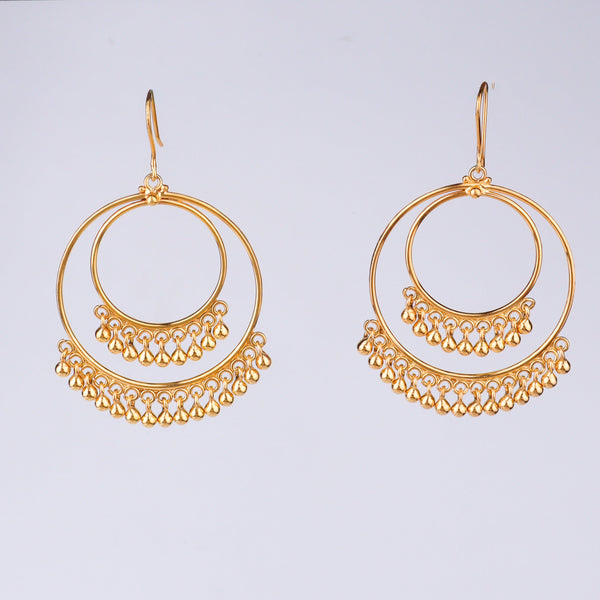Gold earrings with dangling beads