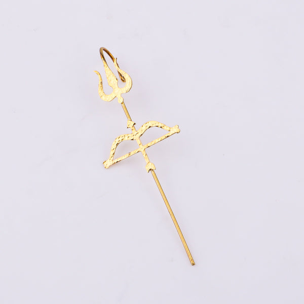 Close-up of gold Trishul Earcuff on ear