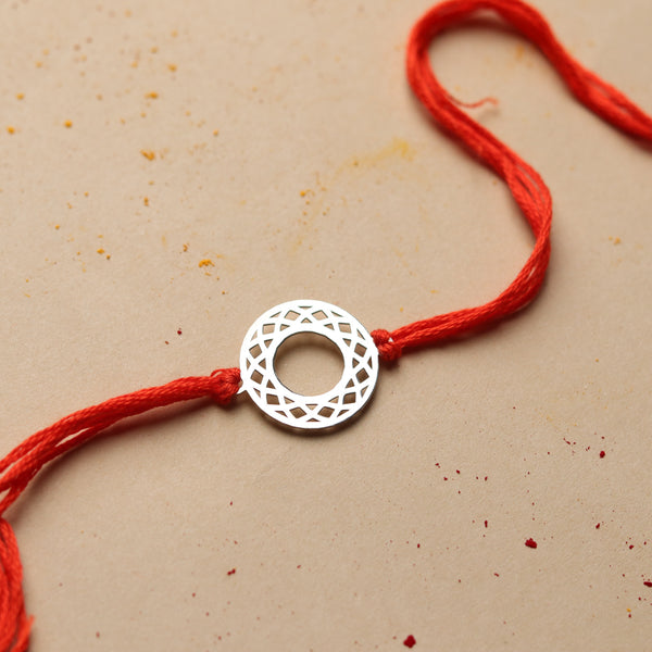 Silver Laser Cut Filigree Round Rakhi