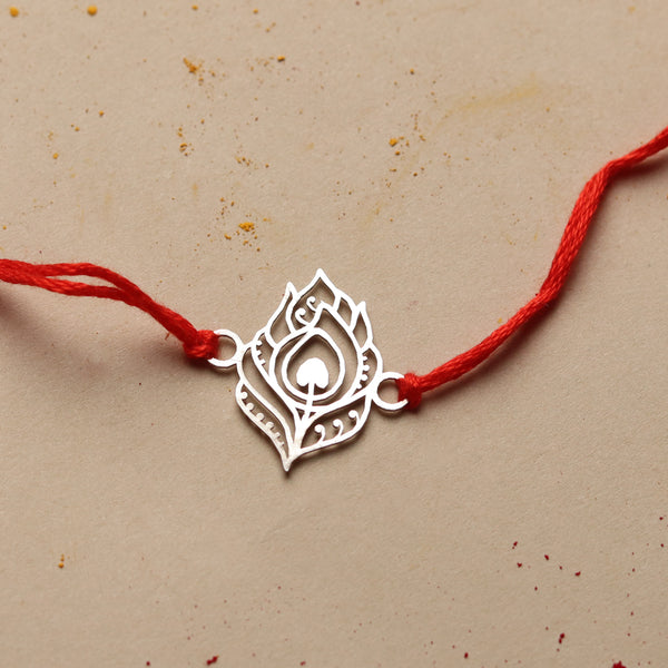 Silver Laser Cut Peacock Feather Rakhi