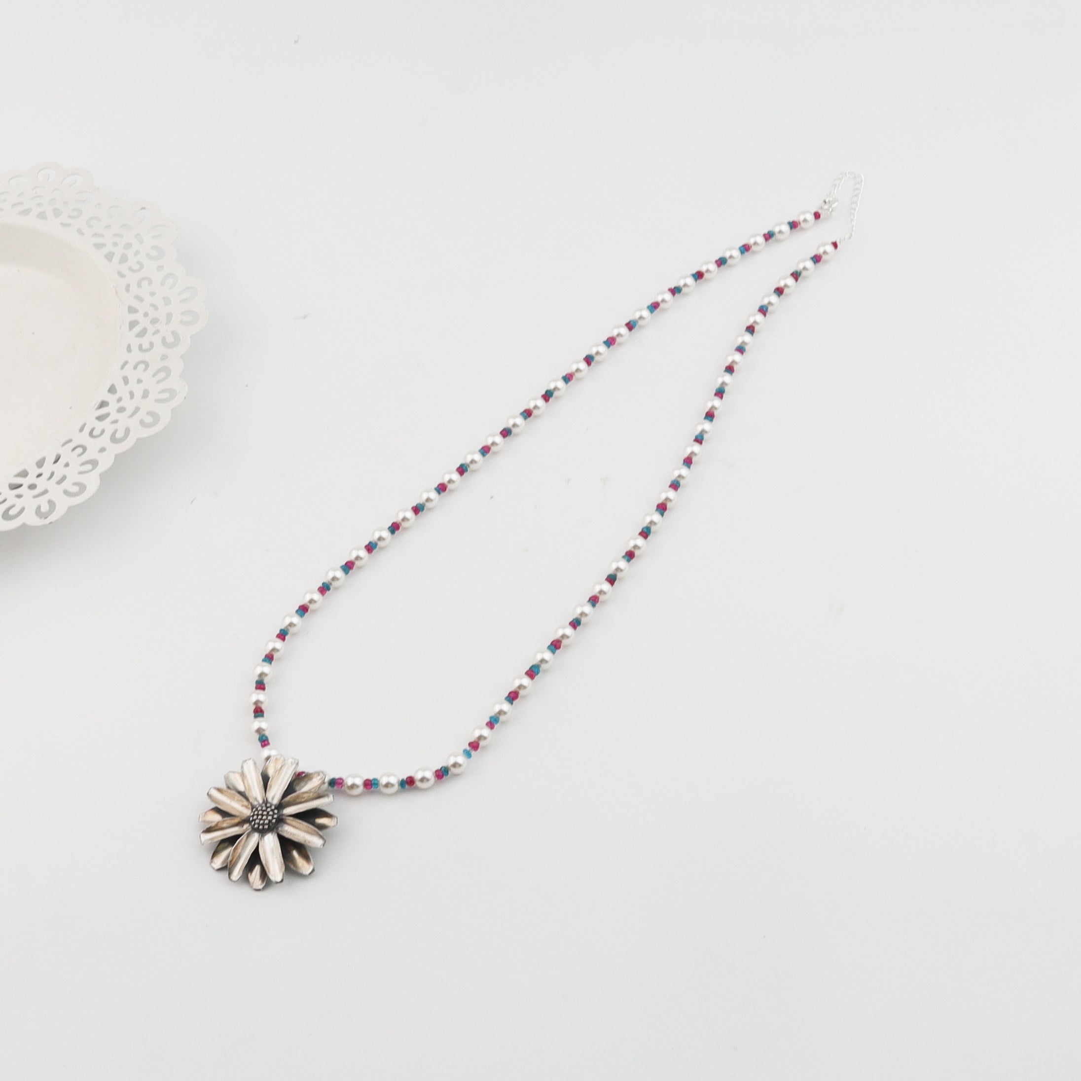 Silver Soorajmukhi Pendant Necklace with Pearls and Semiprecious Stones