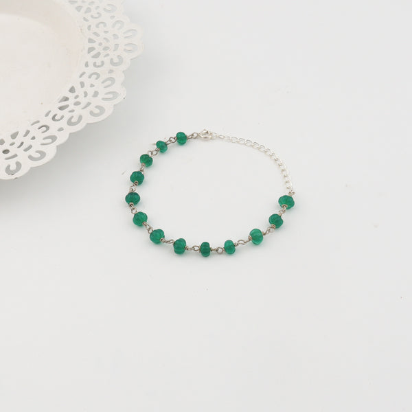 Detail shot of ganthan pattern and green onyx setting